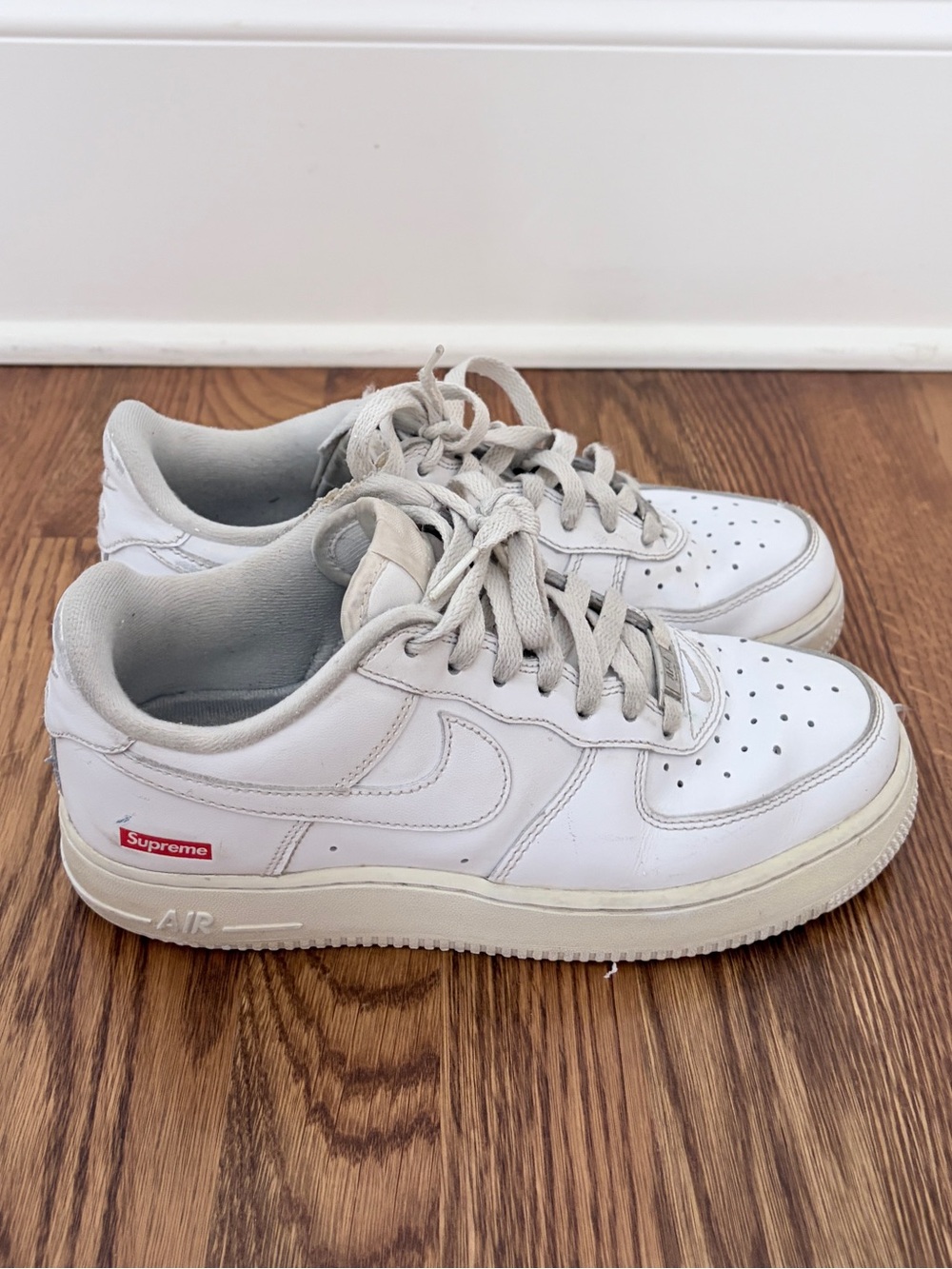 Nike Kids White and Cream Low-Top Sneakers with Red Logo